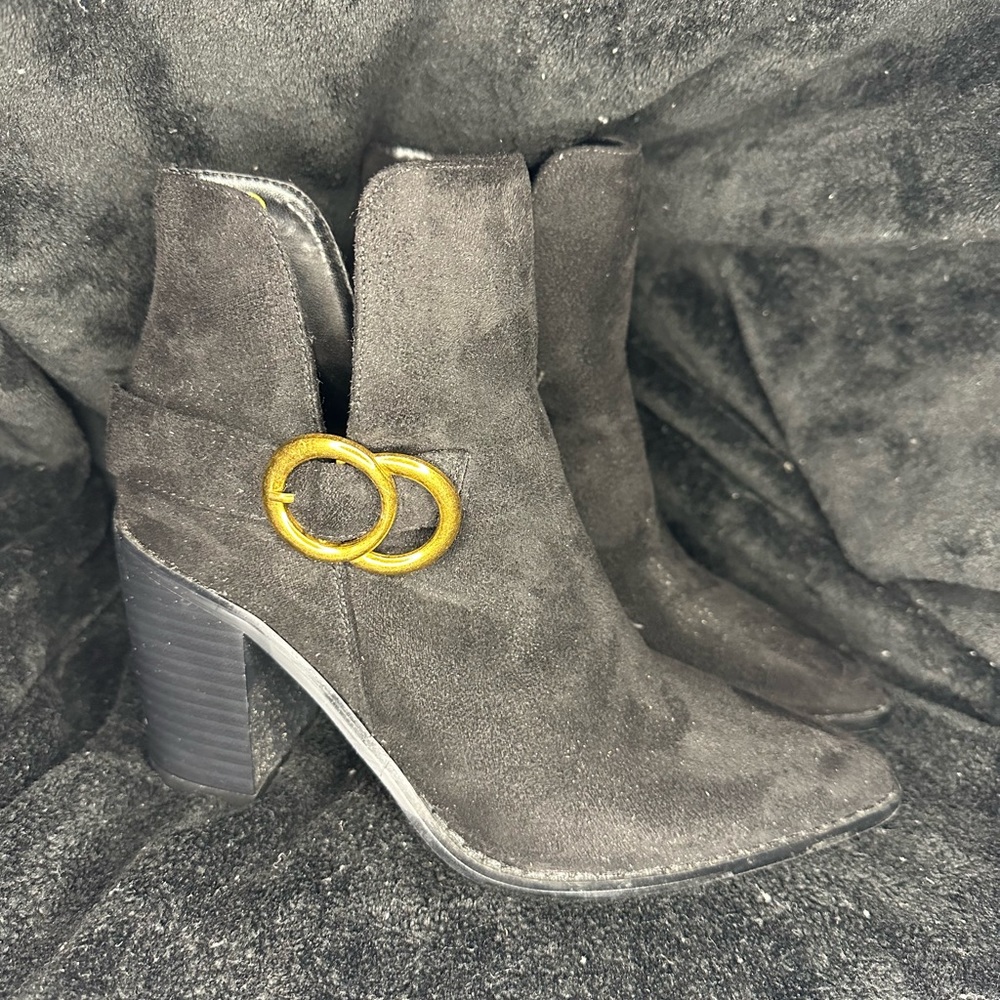 Black boots with gold buckle detail. Worn twice